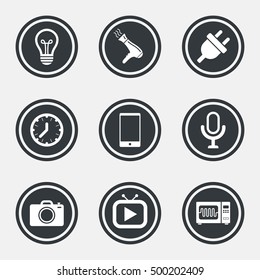Home appliances, device icons. Electronics signs. Lamp, electrical plug and photo camera symbols. Circle flat buttons with icons and border. Vector