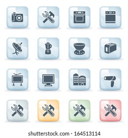 Home appliances icons on color plastics buttons.
