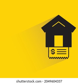 home and bill with shadow on yellow background
