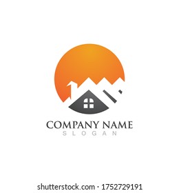 Logotipo y vector del símbolo del hogar y de la construcción