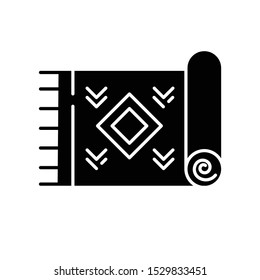 Home carpet glyph icon. Textile item, fabric stuff. Doormat, kilim. Silhouette symbol. Negative space. Vector isolated illustration