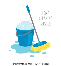 Home cleaning service. Mop and blue bucket full of soapy foam with bubbles, in a puddle of water .