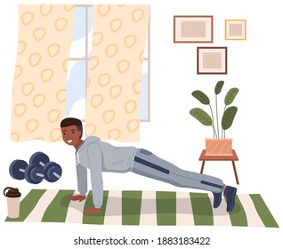 Home exercise. Young man in sports wear doing push-ups at home. How to keep fit indoors. Fitness and morning workout in cozy interior. Healthy lifestyle and wellness concept. Gymnastics practice