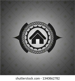 home icon inside black emblem