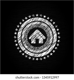 home icon inside chalkboard emblem