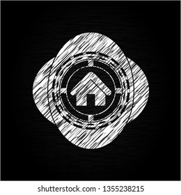 home icon inside chalkboard emblem