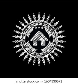 home icon inside chalkboard emblem on black board