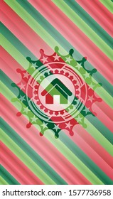 home icon inside christmas colors emblem.