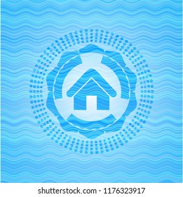 home icon inside light blue water style emblem.