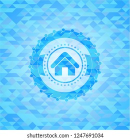 home icon inside light blue mosaic emblem