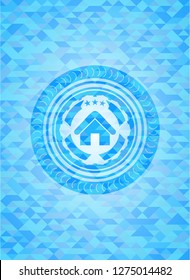 home icon inside light blue emblem with triangle mosaic background