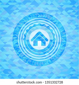 home icon inside light blue mosaic emblem