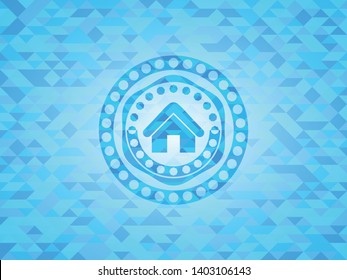 home icon inside light blue emblem with triangle mosaic background