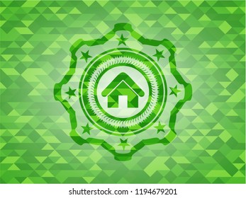 home icon inside realistic green mosaic emblem
