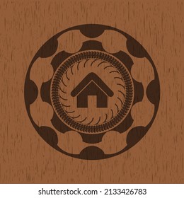 home icon inside vintage wooden emblem. 