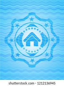 home icon inside water representation emblem.