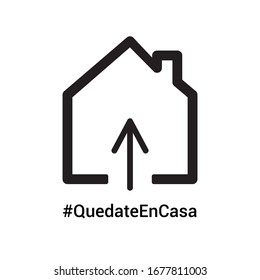 Home icon with spanish hashtag Stay at Home to draw attention that everyones responsibility to stop the coronavirus COVID-19 virus