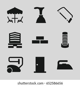 Home icons set. set of 9 home filled icons such as business center building, brick wall, door, plunger, vacuum cleaner, iron, business center, hacksaw