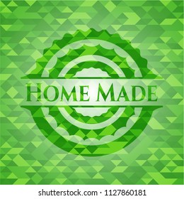 Home Made green emblem with triangle mosaic background