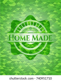 Home Made green emblem with triangle mosaic background
