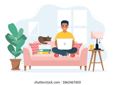 Home office concept, man working from home sitting on a sofa, remote work concept