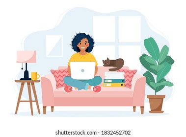 Home office concept, woman working from home sitting on a sofa, remote work concept