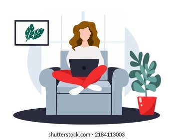 Home office and distance work concept. A young girl sitting at home with notebook and working 