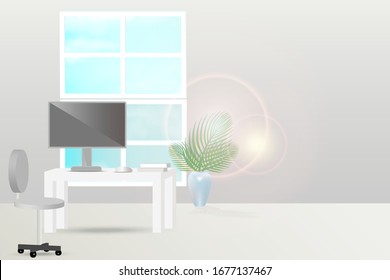 Home office, working space with bright light through windows.