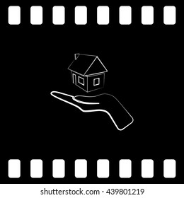 Home on the hand outline vector icon