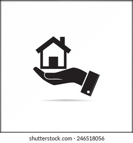 Home on the hand vector icon 