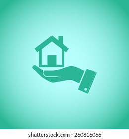 Home on the hand vector icon
