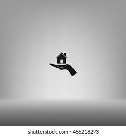 Home on the hand vector icon