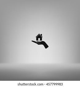 Home on the hand vector icon