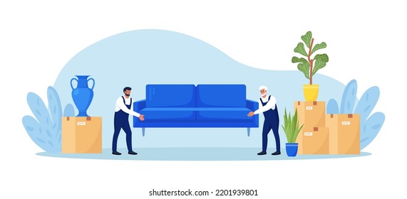 Home relocation. Moving to new apartment. Delivery company services. Loaders in overalls taking sofa, couch, belongs out of apartment. Movers carrying cardboard boxes, assembling furniture