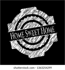 Home Sweet Home chalk emblem written on a blackboard