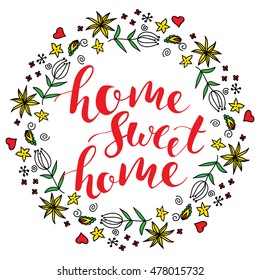 Home sweet home lettering. Colorful flowers wreath. Handwritten modern brush calligraphy for prints, posters, cards design. Vector ink phrase. Quote for housewarming. Hand drawn inscription.