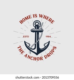 Home is where the anchor drops. Nautical t shirt print with anchor and inscriptions. Vintage tee print design.