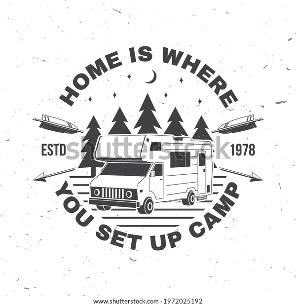 Home is\
where you set up camp. Summer camp. Vector . Concept for shirt or\
logo, print, stamp or tee. Vintage typography design with camper\
trailer and forest silhouette. Camping\
quote.