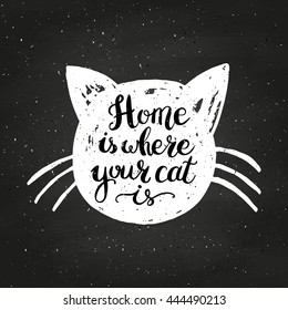 Home is where your cat is on chalkboard. Hand drawn inspirational quote with a pet. Lettering design for posters, t-shirts, cards, invitations, stickers, banners, advertisement. Vector.