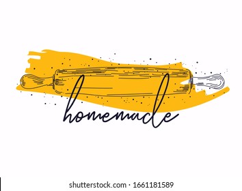 Homemade phrase handwritten with cursive calligraphic font on rolling pin.