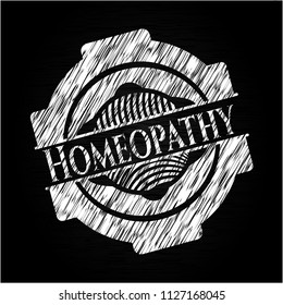 Homeopathy written on a chalkboard