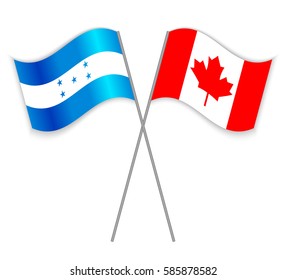 Honduran and Canadian crossed flags. Honduras combined with Canada isolated on white. Language learning, international business or travel concept.