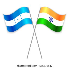 Honduran and Indian crossed flags. Honduras combined with India isolated on white. Language learning, international business or travel concept.