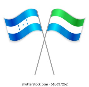 Honduran and Sierra Leonean crossed flags. Honduras combined with Sierra Leone isolated on white. Language learning, international business or travel concept.