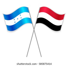 Honduran and Yemeni crossed flags. Honduras combined with Yemen isolated on white. Language learning, international business or travel concept.