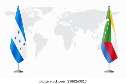 Honduras and Comoros flags for official meeting against background of world map.