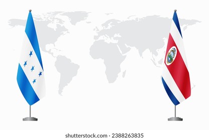 Honduras and Costa Rica flags for official meeting against background of world map.