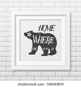 Hone is where the heart is - Quote typographical Background in realistic square white frame on the brick wall background. Vector EPS10 illustration. 
