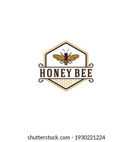 logotipo de abeja miel completo con ilustración de abeja y panal de miel
