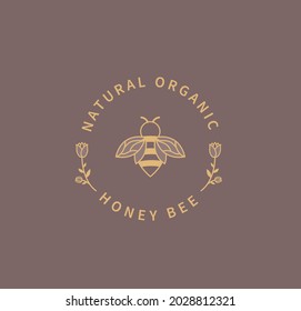 Honey bee logo. Natural and organic ingredient for food, cosmetology. Template design in minimal style, emblem for web, package, advertise with bee silhouette and flower.Vector illustration.